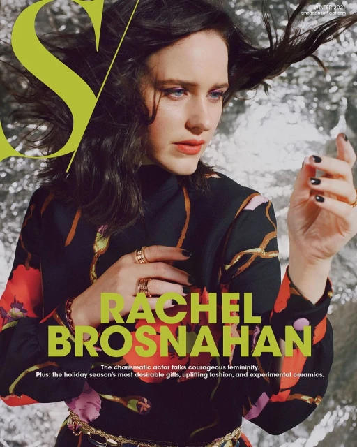 Magazine cover featuring Rachel Brosnahan in a floral-print dress against a silver background, styled with multiple rings and a chain belt.