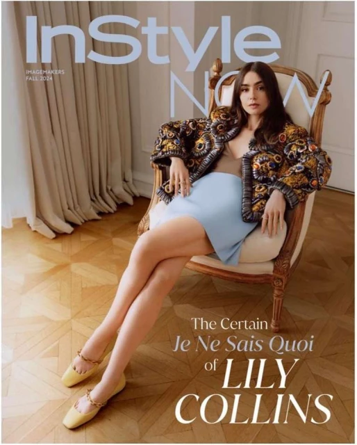 Magazine cover featuring Lily Collins seated in an ornate chair, wearing a patterned jacket and light blue skirt against a neutral backdrop.