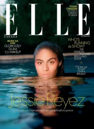 Magazine cover portrait of a woman in a pool with water up to her chest, photographed by Leeor Wild.