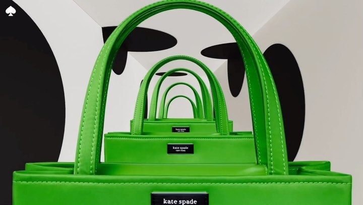 Bright green Kate Spade tote bags in a diminishing perspective arrangement, set against a backdrop of white and black abstract shapes.