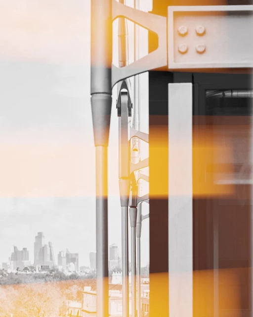 Abstract architectural detail with metal structures against a city skyline, featuring industrial design and urban elements.