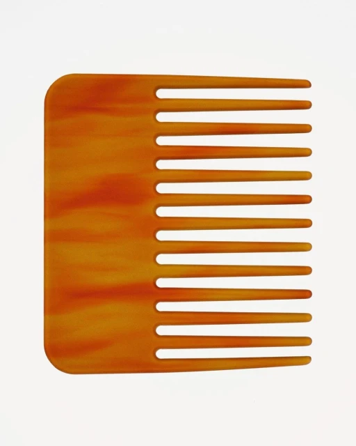 Close-up studio shot of a brown, patterned hair comb on a white background, used for detangling and styling hair.