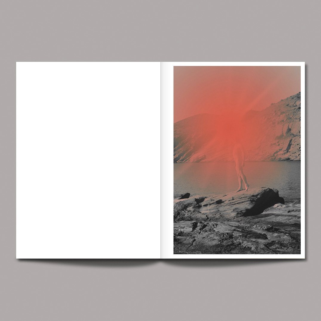 Artistic magazine spread featuring a blurry human figure standing on rocks at the edge of a lake with mountains in the background.
