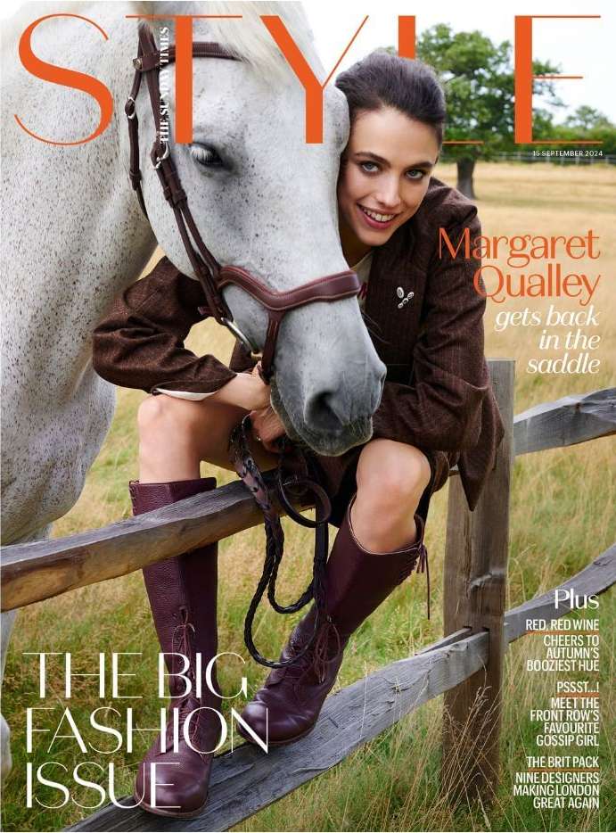 Magazine cover featuring Margaret Qualley with a white horse, set against a green field with a wooden fence. Fashion and equestrian themes.
