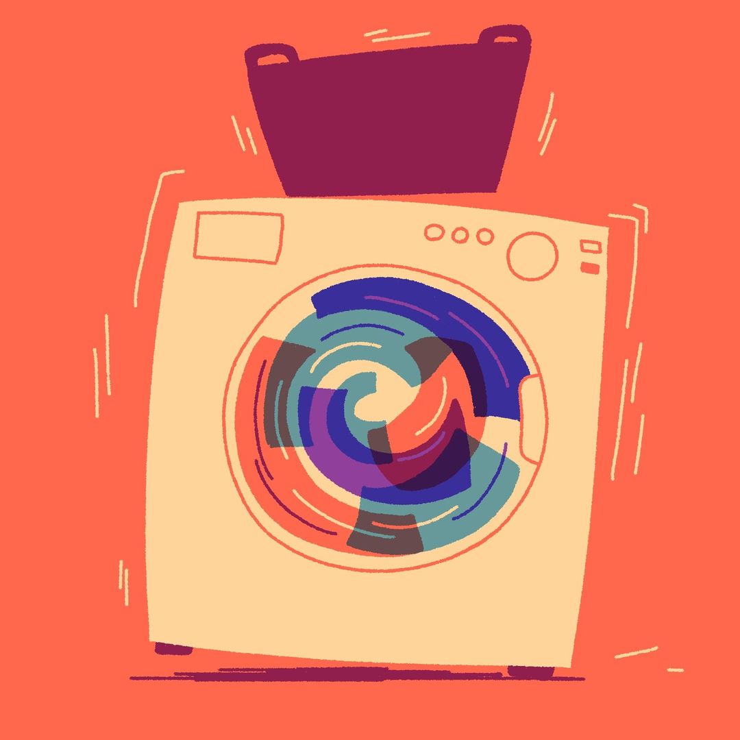 Cartoon image of a washing machine with a laundry basket on top, depicted in shades of orange, cream, purple, and blue.