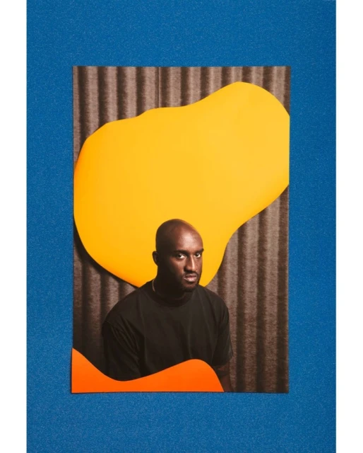 Portrait of a Black adult male in a black shirt on a digitally collaged background with orange and yellow shapes on a blue backdrop.