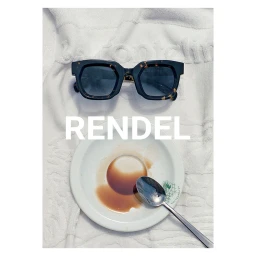 Tortoiseshell sunglasses resting on a white towel above a used white plate with a spoon and spilled coffee.