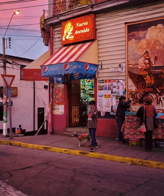 A daytime street view showcases a child with a dog, several adults, commercial awnings, and a building mural under a pink-tinged sky.