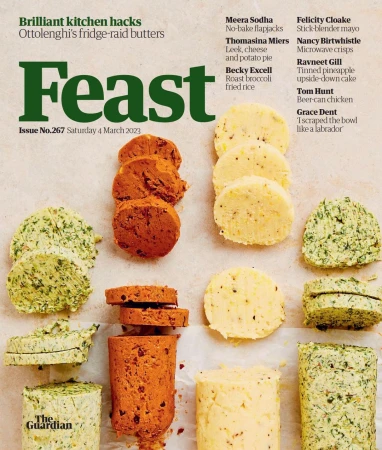 Magazine cover of Feast featuring several round cuts of flavoured butter, in tones of yellow, green, and brown, food and drink concept.