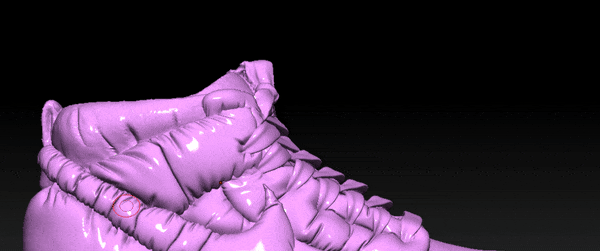 Close-up 3D rendering of puffy, textured pink high-top sneaker isolated against a dark background, showcasing its unique design.