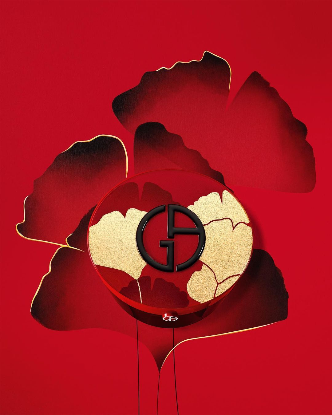 Giorgio Armani beauty product features a compact with a black logo on a gold and red floral background. The product is displayed on red.