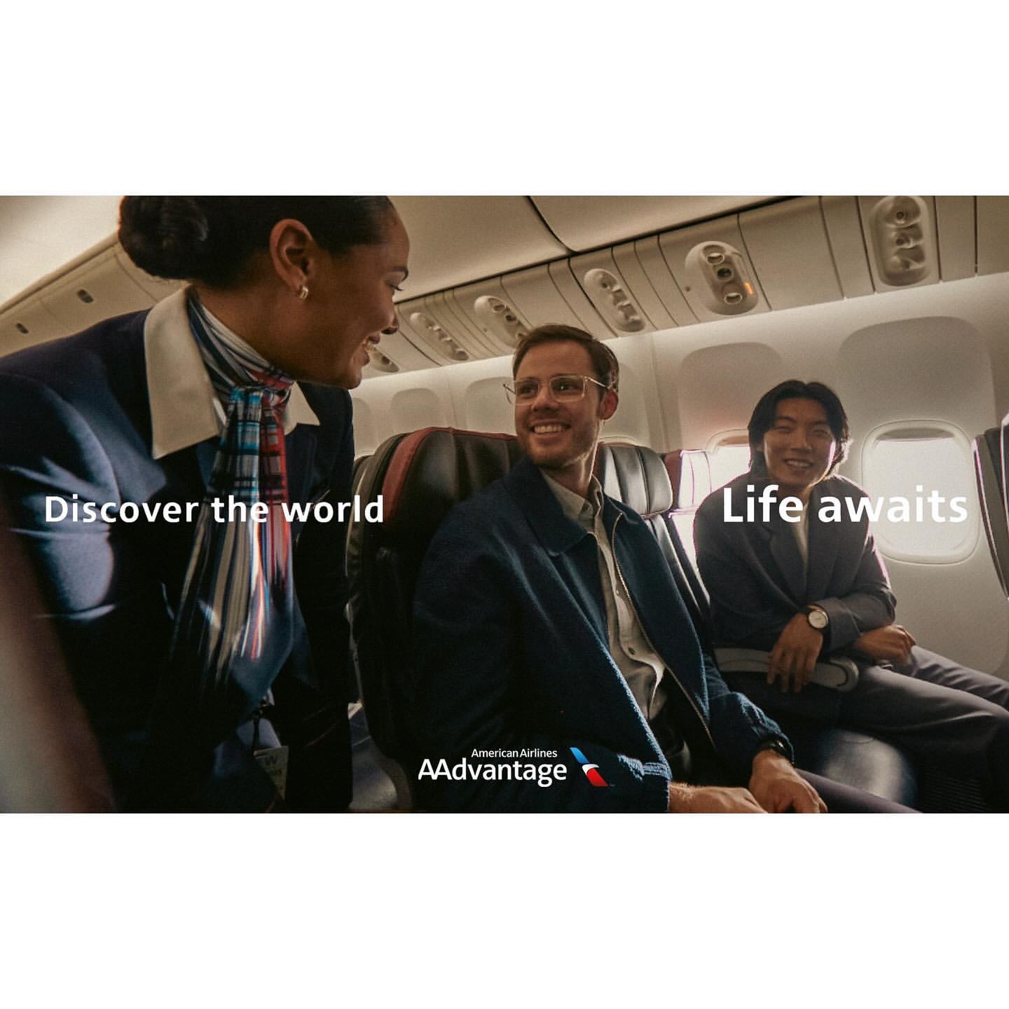 Three people on an airplane: a flight attendant, a passenger in glasses, and another passenger looking out the window. Travel theme.