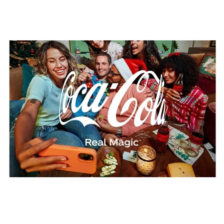 Festive Coca-Cola advertisement featuring a group of smiling adults taking a selfie in a decorated living room with Coca-Cola bottles.