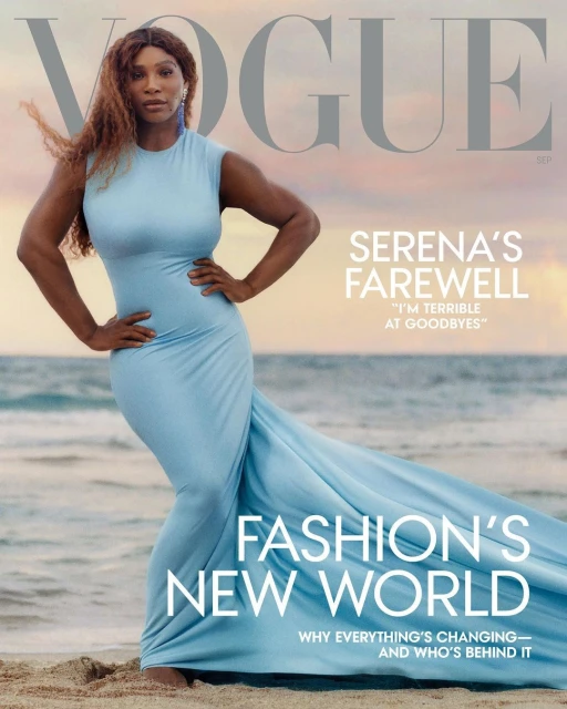 Serena Williams poses in a light blue dress on a beach for a Vogue magazine cover, set against a serene sky. Fashion and celebrity.