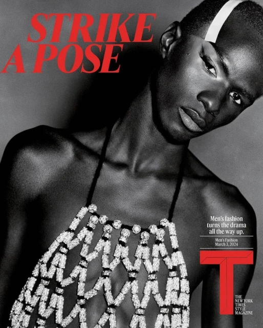 Striking fashion magazine cover featuring a Black model with a beaded top against a dark grey background with red and white text.