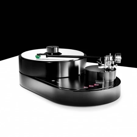 Sleek black turntable with metal arm and white disc, isolated on white surface against black backdrop, studio product shot.