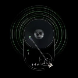 Top down view of a black vinyl turntable with glowing green sound wave circles on a dark background