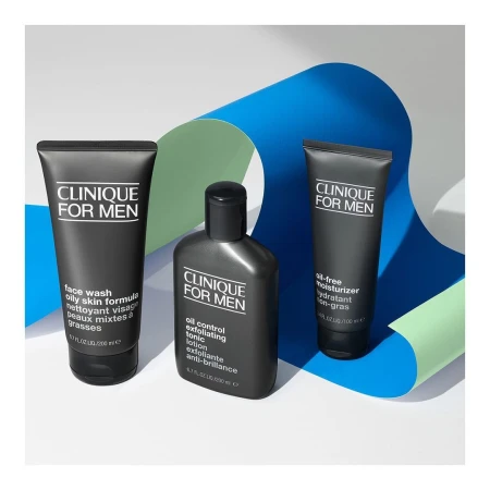 Three black Clinique for Men skincare product bottles, including face wash, toner, and moisturizer, displayed against a blue and green backdrop.