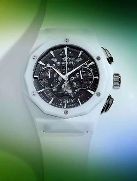 Close-up of a luxury white Hublot wristwatch with a skeleton dial, showcasing its intricate design and precision craftsmanship.