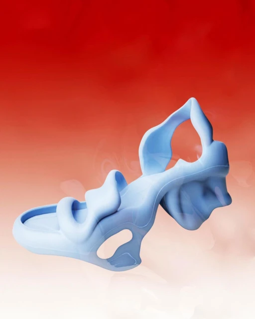 Abstract blue sculpture against a graduated red background. Modern art piece with organic shapes and smooth, matte finish, studio lighting.