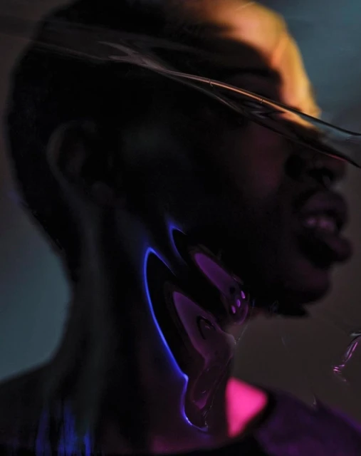 Dramatic portrait of a Black adult male's face partially obscured by a distorted plastic sheet, featuring vibrant neon pink and blue lighting.