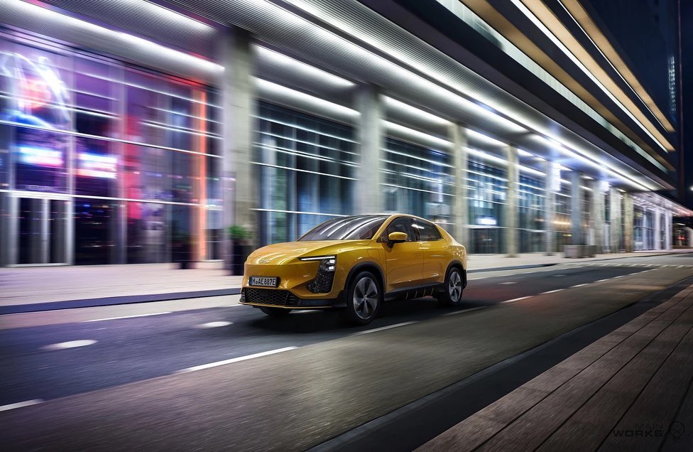 A yellow electric car drives on an urban city street at night. Modern glass buildings with lights glow in the background.