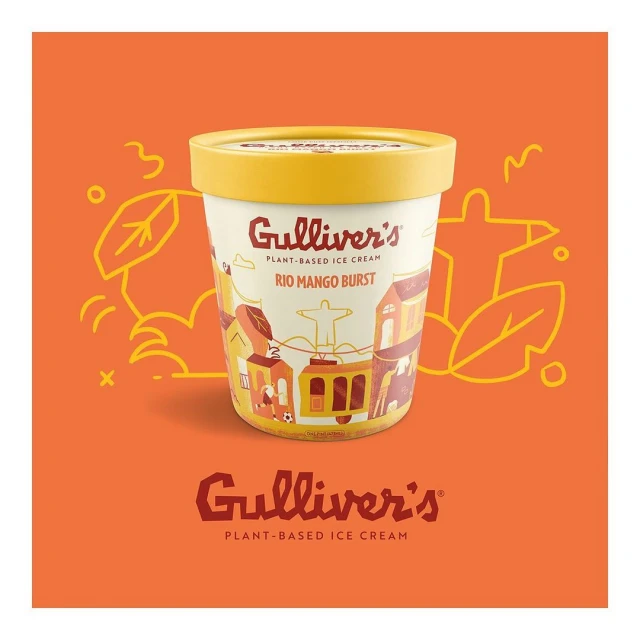 Eye-level studio shot of a pint of Gulliver's Rio Mango Burst plant-based ice cream set against an orange background with line-art leaves.
