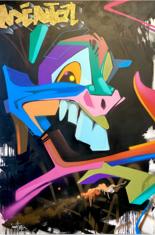 Colorful graffiti-style art featuring an abstract animal face with bold lines and gold accents on a black background.