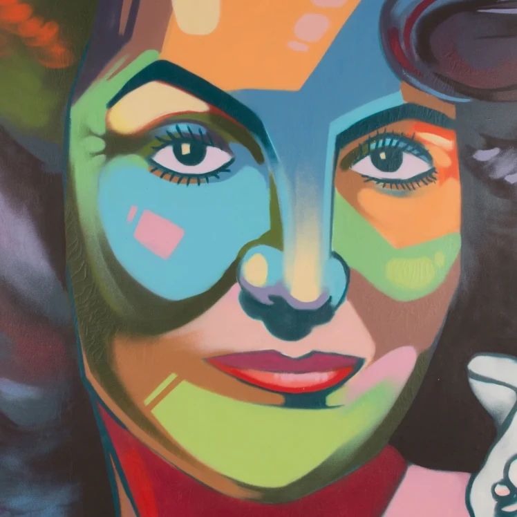 Colorful pop art style painted portrait of a woman's face with bold geometric color blocking and dark hair.
