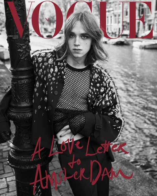 Vogue Netherlands magazine cover features a young adult, stylish shirt and jacket, with Amsterdam canal and buildings as backdrop.