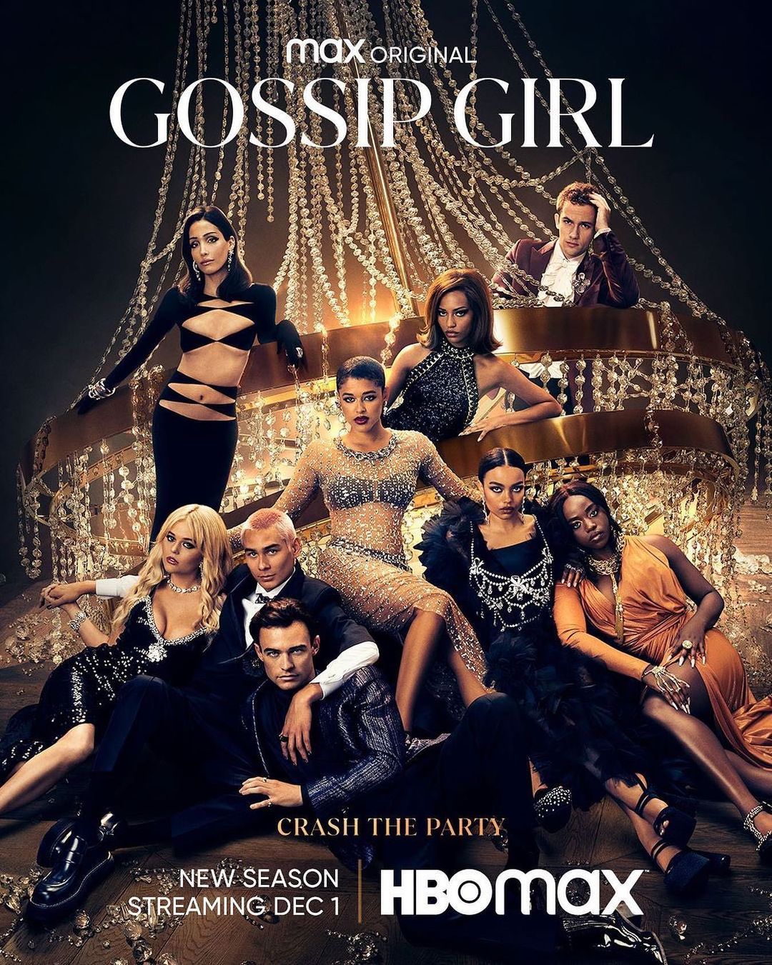 Promotional image for the new season of Gossip Girl featuring ten cast members in formal wear posing against a chandelier backdrop.