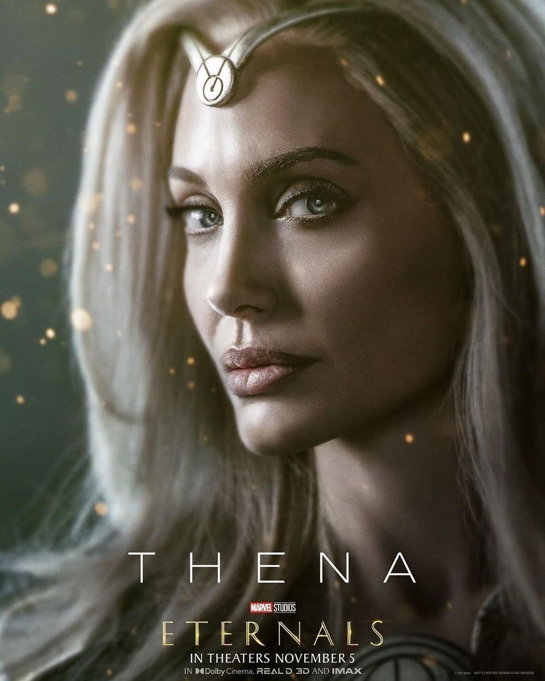 Close-up portrait of actress Angelina Jolie as Thena from Marvel Studios' Eternals, showcasing her platinum blonde hair and headpiece.