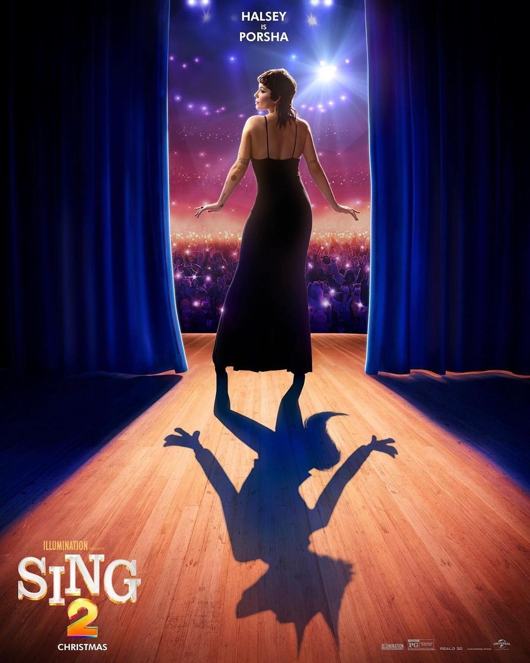 Movie poster for Illumination's Sing 2 Christmas features a woman in a black dress standing in the center of an illuminated stage.