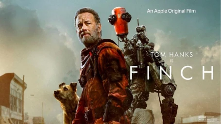 Tom Hanks wearing a rusty orange jumpsuit standing beside a robot and a dog against a hazy outdoor background.