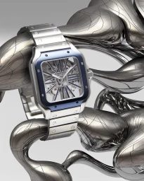 Luxury skeleton watch with a blue bezel resting on fluid metallic abstract sculptures against a plain grey background.