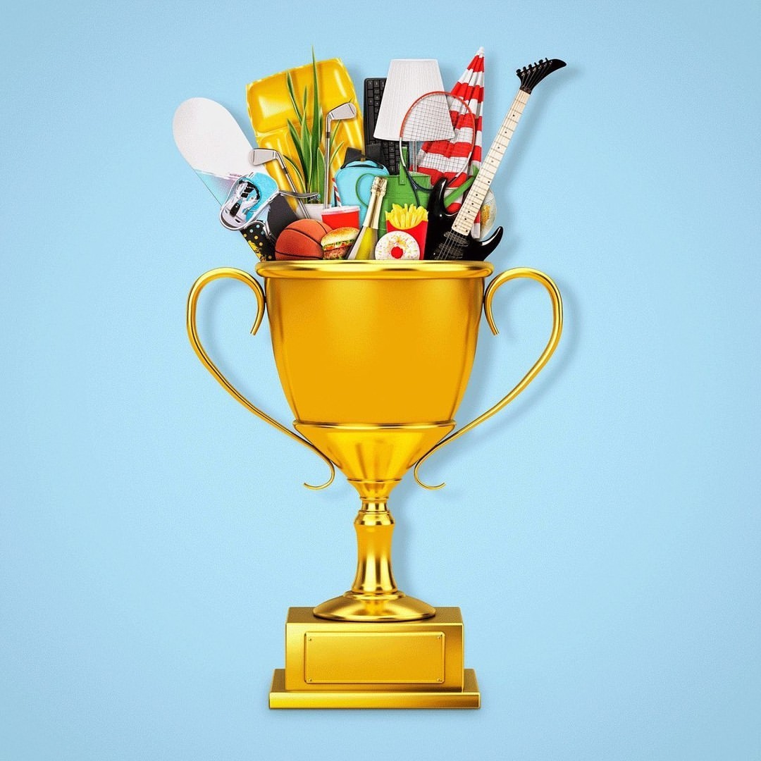 Gold trophy overflowing with items like a guitar, lamp, tennis racket, basketball, french fries, and a donut against a light blue backdrop.