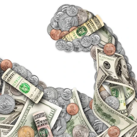 Money and currency arranged in the shape of a bicep, showcasing strength in finance and economy with dollar bills and coins.