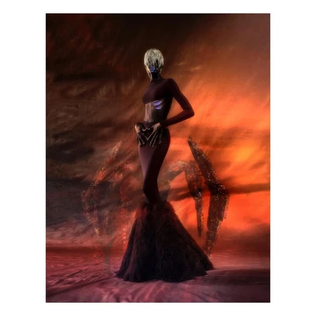Elegant woman in a maroon gown with a dramatic feathered skirt poses against a swirling orange and black abstract background in a studio setting.