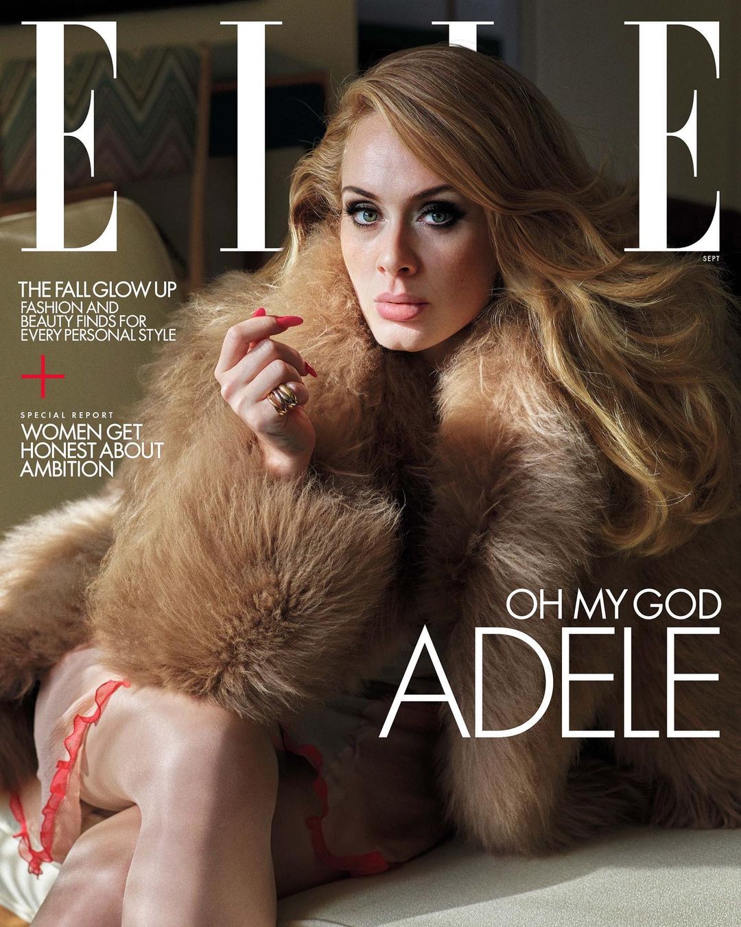 Elle Magazine cover featuring singer Adele wearing a fur coat, with the magazine's title and Adele's name in large text.