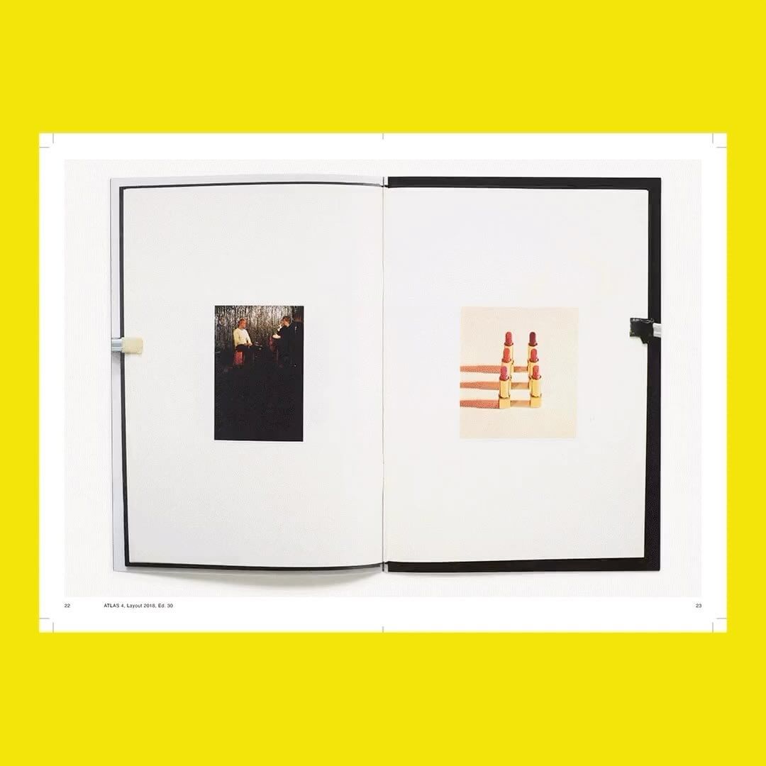 Open book displays photographs: one of a group of people in a forest and another of six lipsticks arranged in two columns.