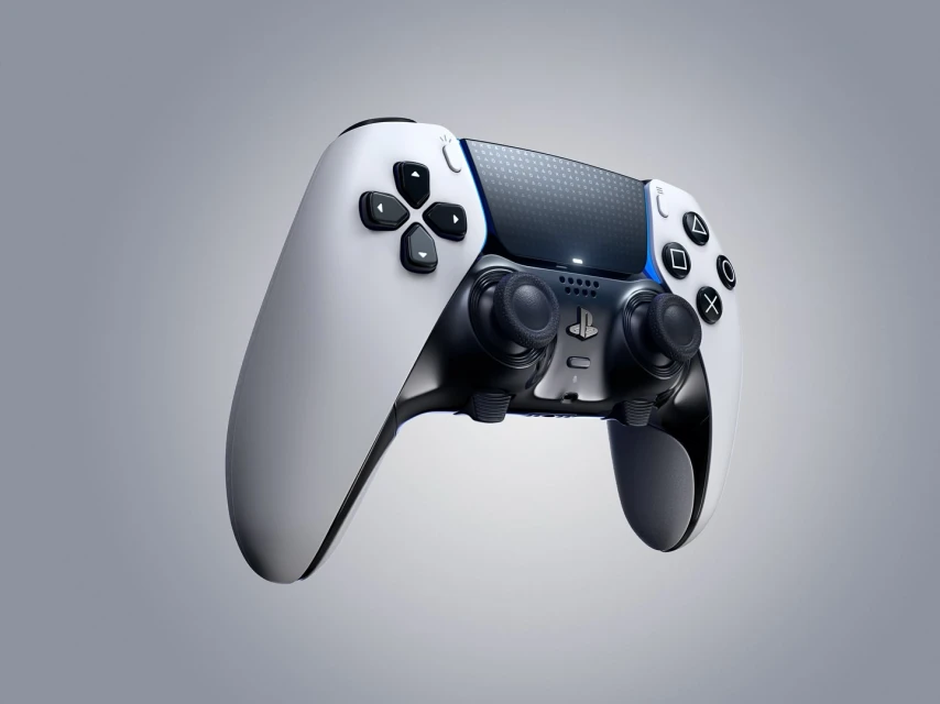 Floating PlayStation 5 DualSense Edge controller on a gray gradient background, showcasing its white and black design with signature buttons.