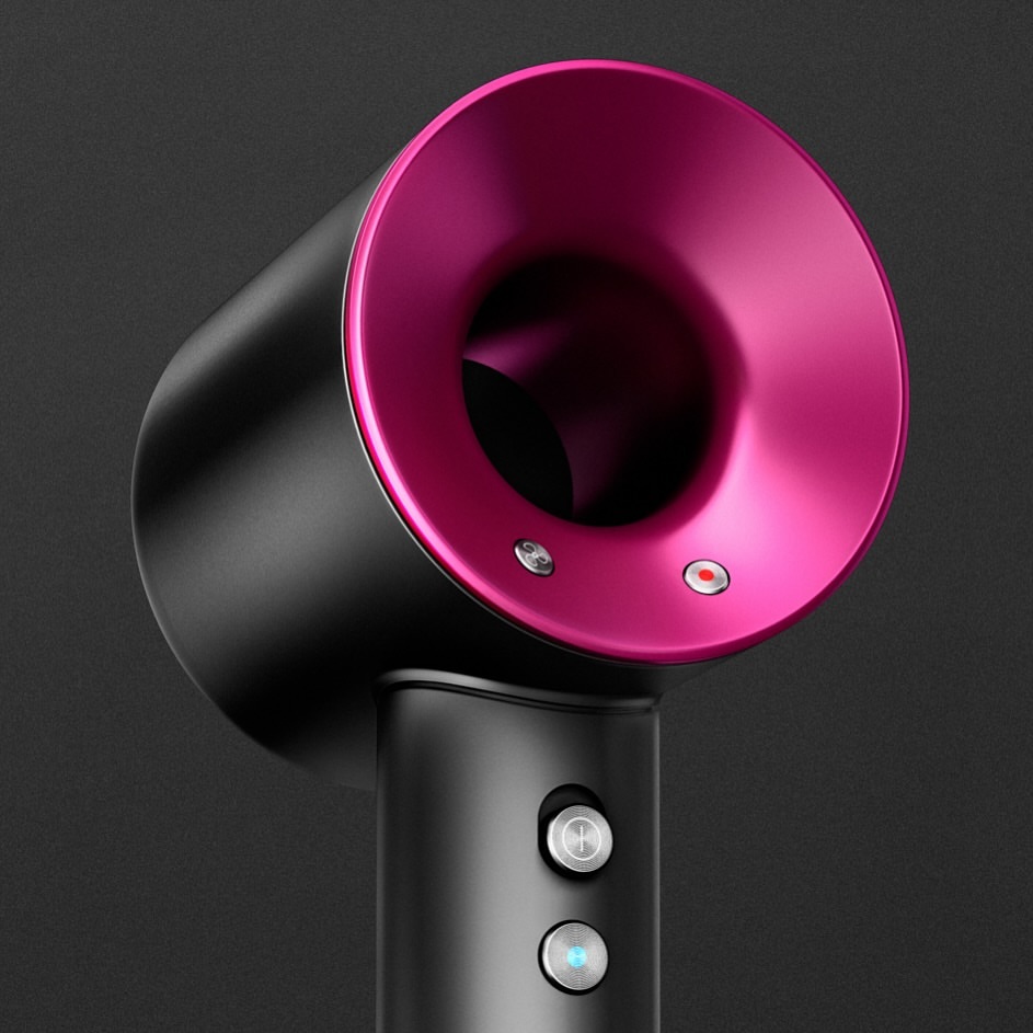 Hair dryer on a black background. Sleek black hair dryer with a shiny, round, hot pink nozzle and silver buttons.