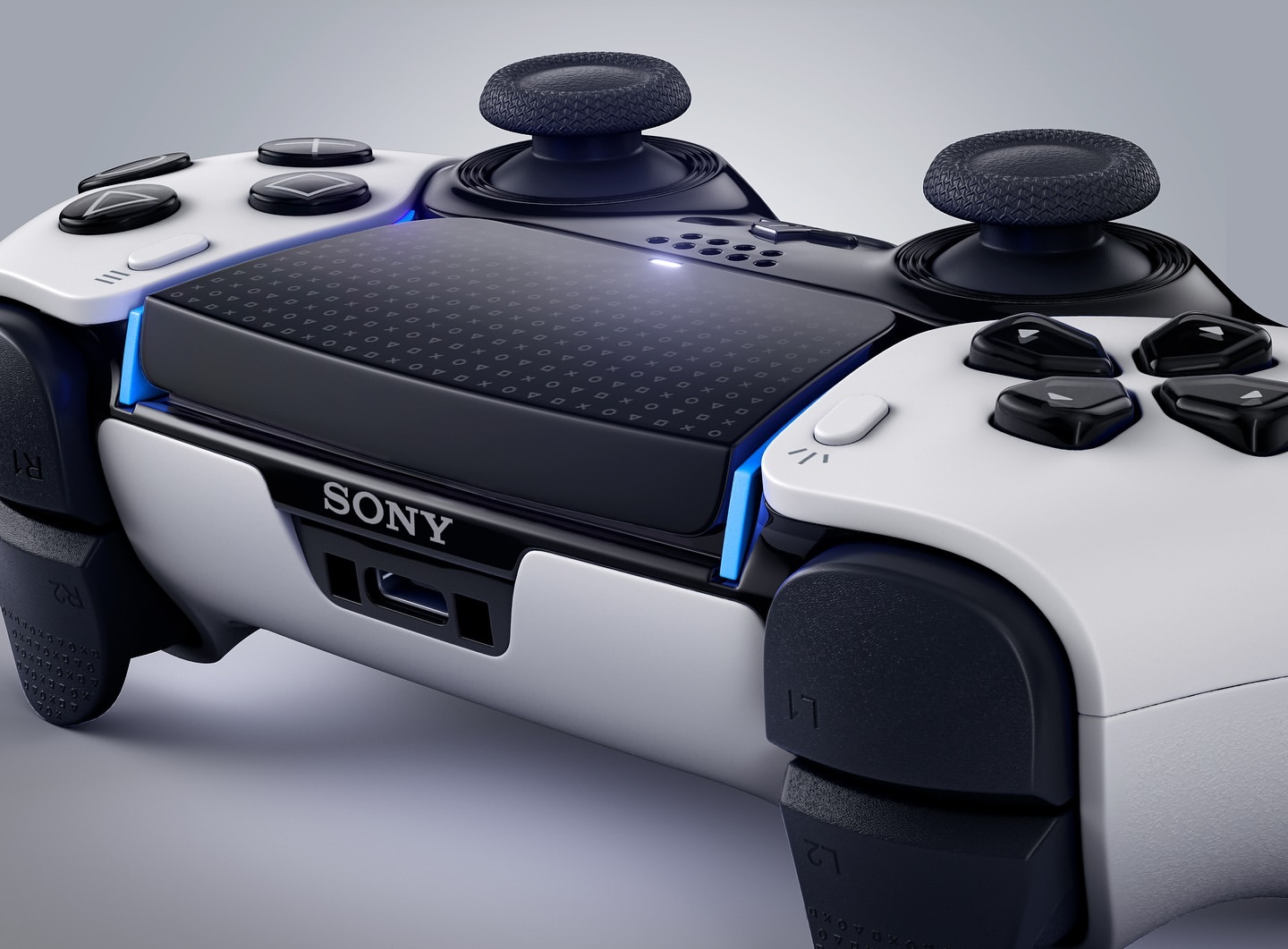 Close-up studio shot of a white and black Sony PlayStation 5 DualSense Edge Wireless Controller, angled view showcasing design and features.
