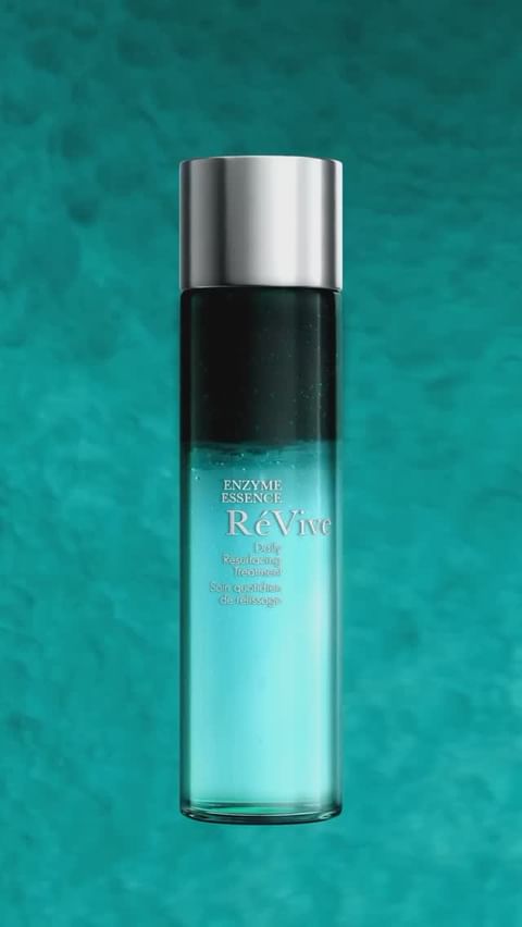Revive Enzyme Essence bottle against a teal backdrop featuring the product's container in gradient hues and silver accents.