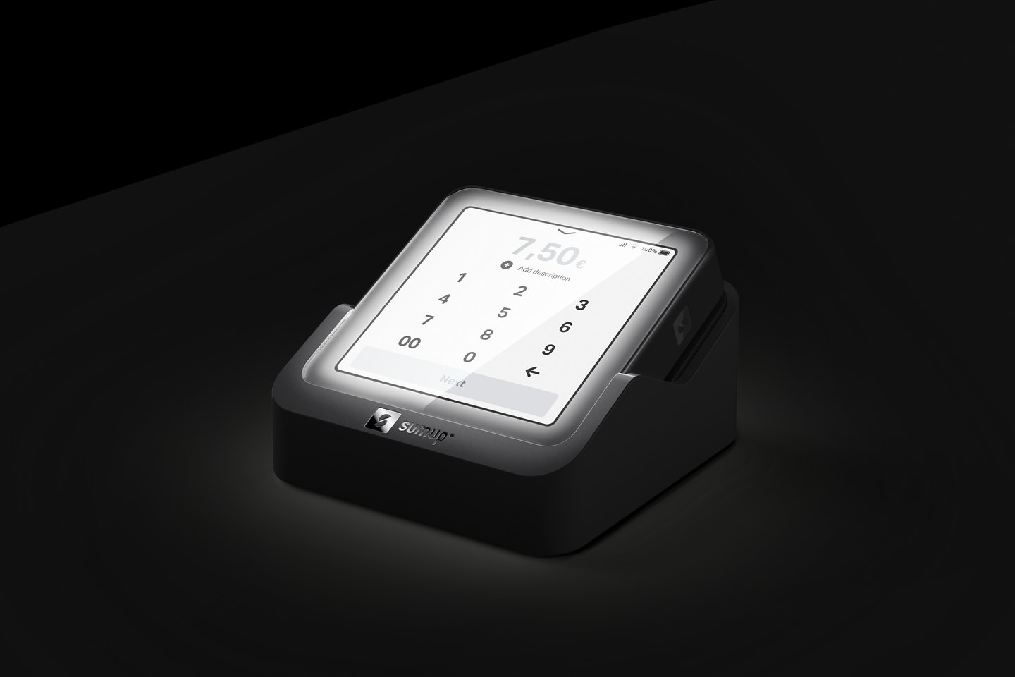A digital payment terminal displays a keypad and a monetary value of 7.50 against a dark, shadowy background in a studio product shot.