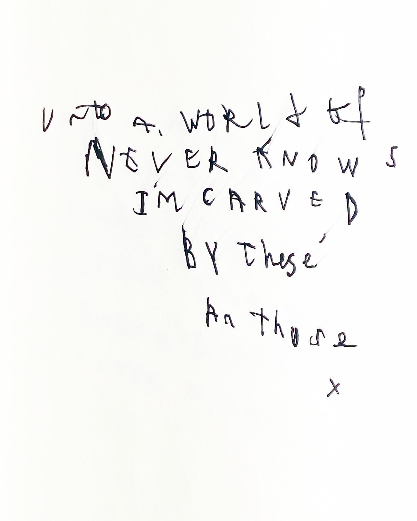 Handwritten lyrics on a white background, featuring phrases such as 'Unto a world of never knows' and 'I'm carved by these.'