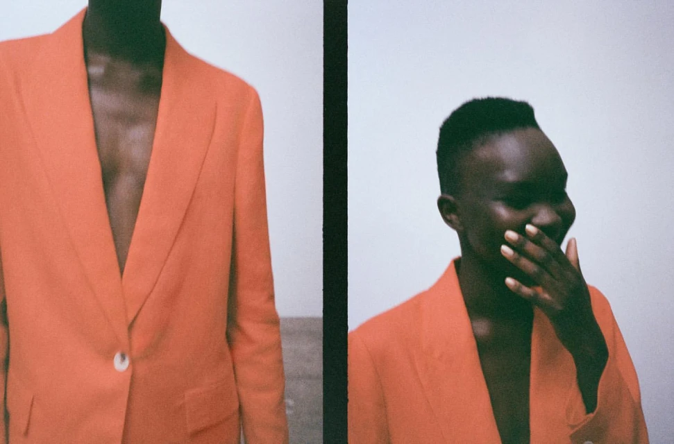 Two-panel fashion shot of a Black woman in an orange blazer, smiling with hand near face against a clean white background. 