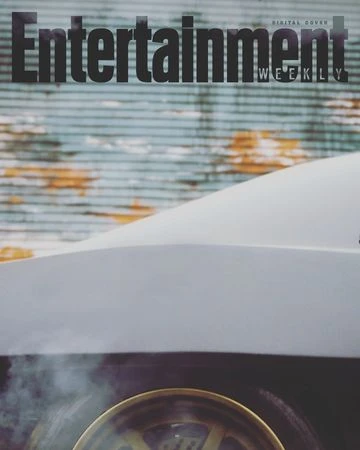 Entertainment Weekly digital cover features a car hood and a partially visible wheel with steam, set against a textured, weathered background.