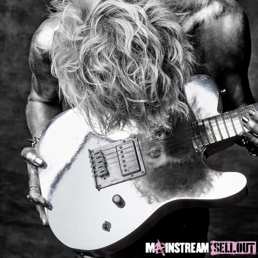 Shirtless man with long blonde hair holds a silver electric guitar with black hardware in a studio, album cover art.
