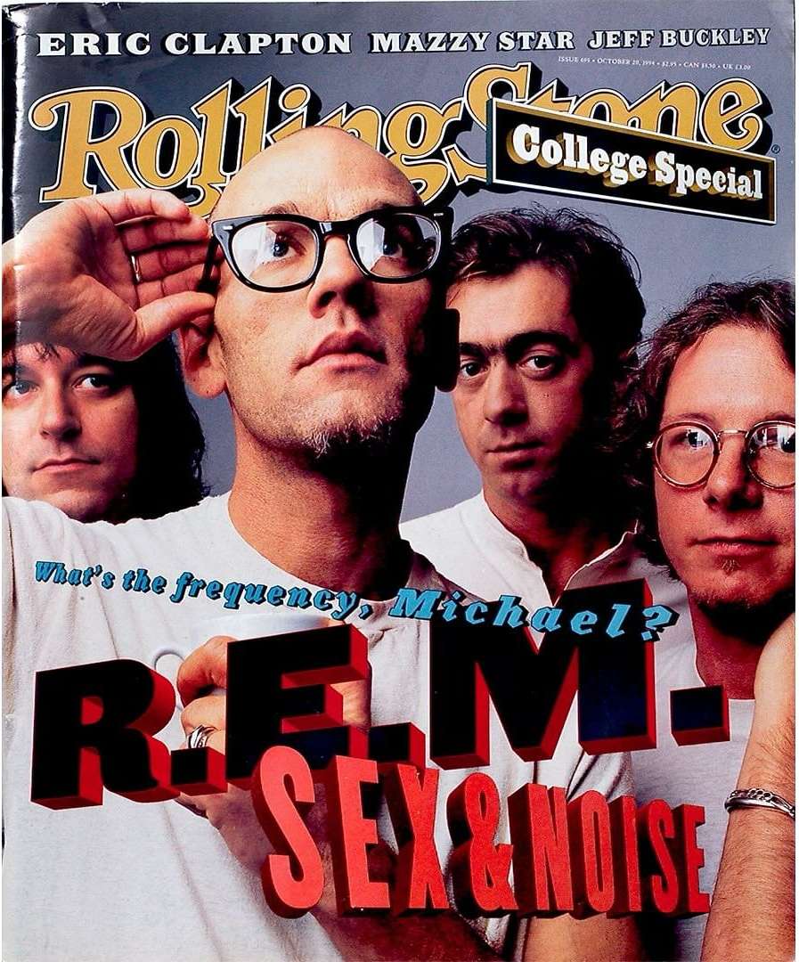 Rolling Stone magazine cover featuring a close-up of four people: bald man in glasses in foreground, three other people behind him.
